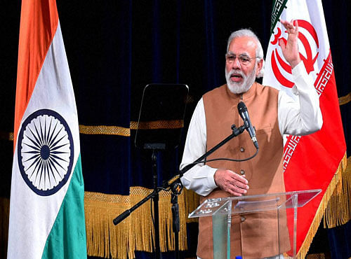Prime Minister Narendra Modi addresses after releasing a manuscript, 'Kalileh wa Dimneh' an old translation into Persian of Panchatantra and Jataka at Vahadat hall in Tehran, Iran on Monday. PTI Photo
