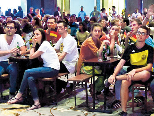 German and British expats watch the Euro Cup football on a giant screen at a hotel in the city on Tuesday. DH PHOTO