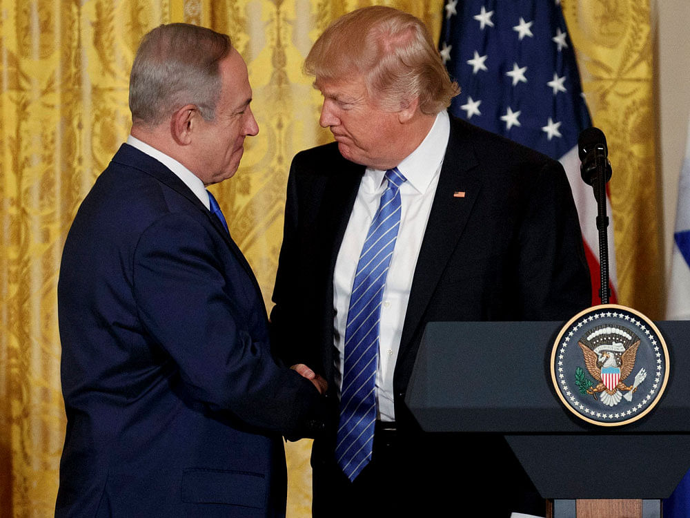 President Donald Trump shakes hands with Israeli Prime Minister Benjamin Netanyahu during a news conference in the East Room of the White House, Wednesday, Feb. 15, 2017, in Washington. AP/PTI