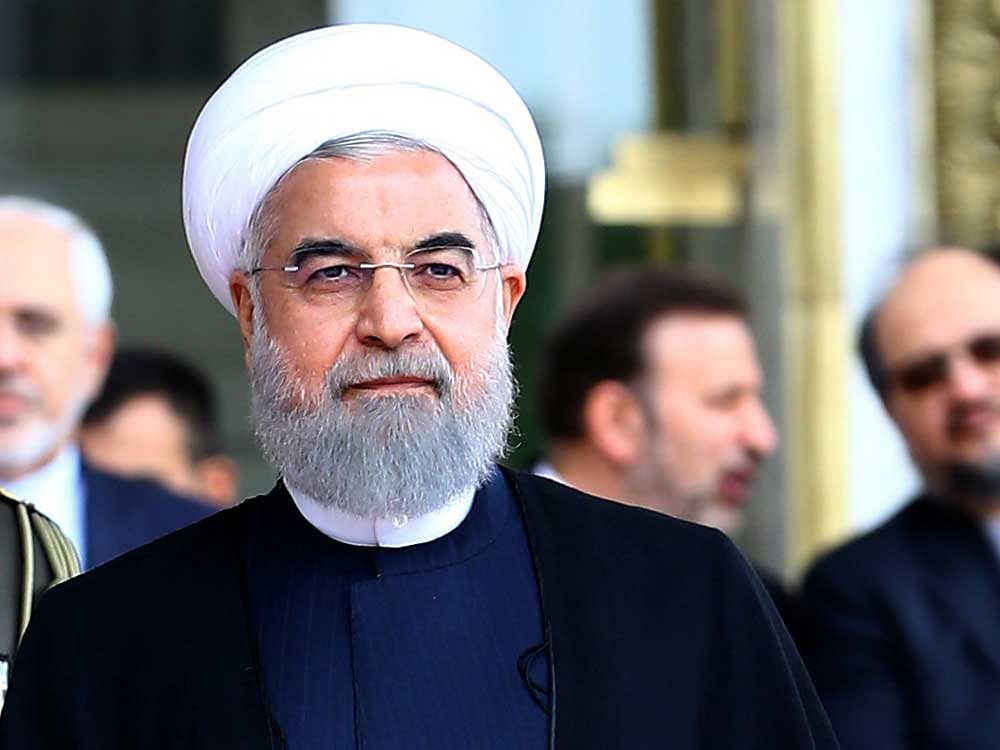 The Times said that the attack was Iran's first significant cyber attack on a British target after the hack was initially blamed on Russia. Aboue: Hassan Rouhani. Reuters file photo.