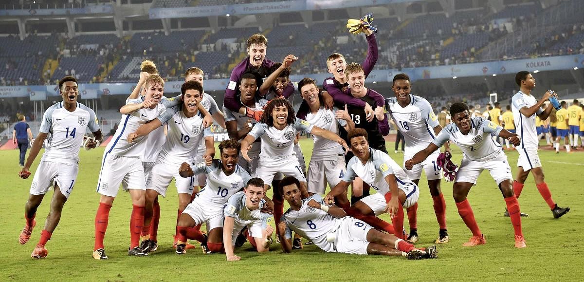 England players celebrate their win against Brazil in the FIFA U-17 World Cup 2017 semifinal match in Kolkata on Wednesday. PTI Photo by Ashok Bhaumik