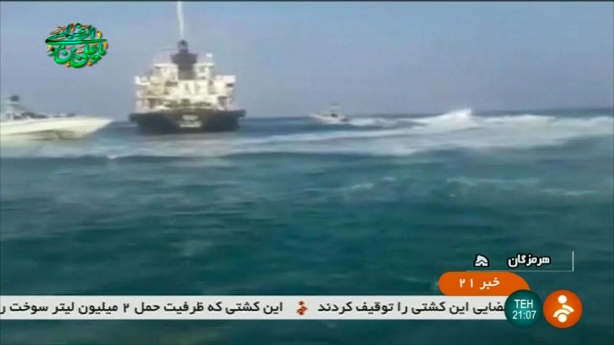 An image grab taken from a video released by the Iranian Revolutionary Guards on July 18, 2019, reportedly shows the Panamanian-flagged tanker Riah, that was detained by Iran's Revolutionary Guards, in the highly sensitive Strait of Hormuz. - Iran's Revolutionary Guards said they had detained a "foreign tanker" and its 12 crew for allegedly smuggling fuel, the latest incident in a tense standoff in the Gulf.  (Photo by STRINGER / IRINN / AFP)