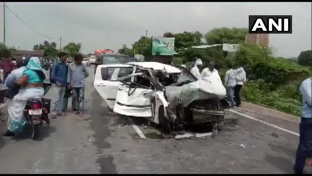 The car had smashed head-on into a truck. (Photo / ANI Twitter)