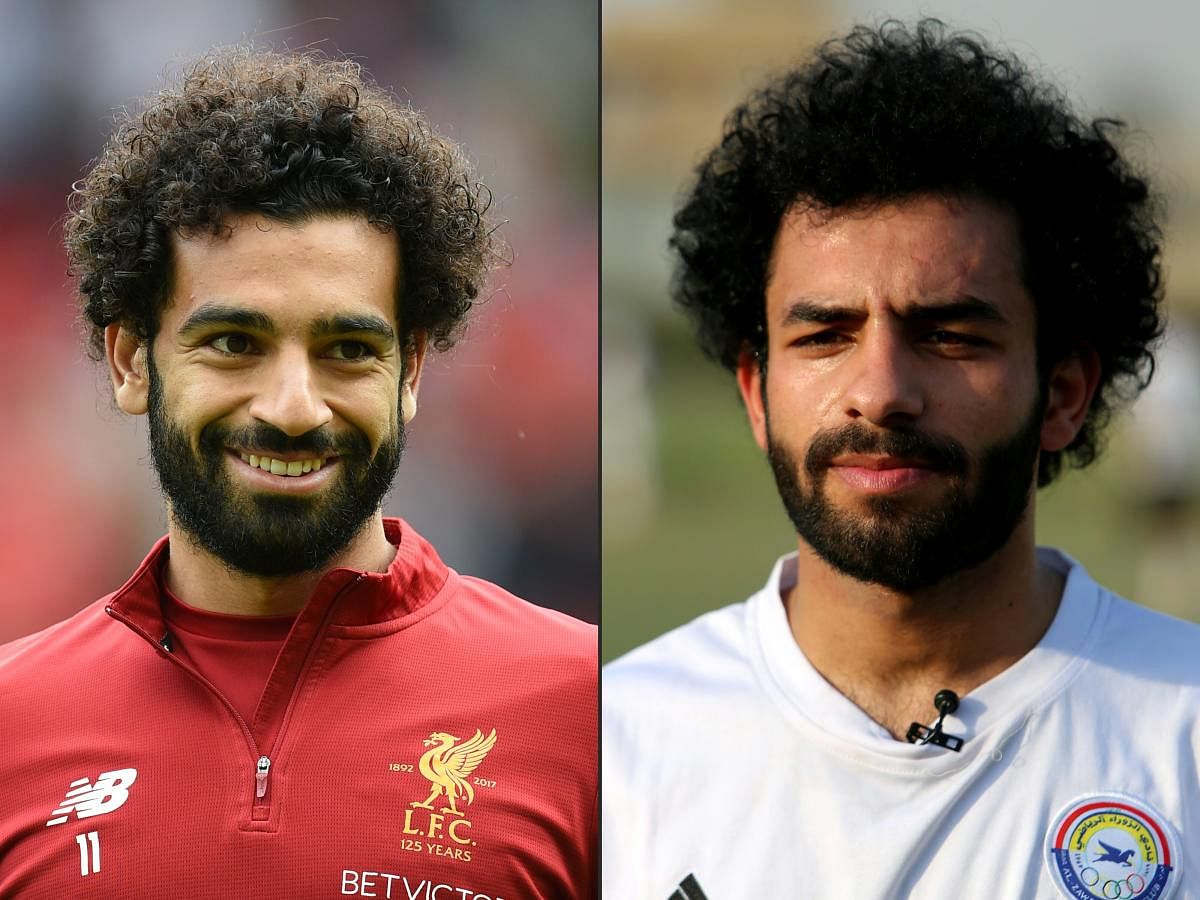 With his black beard, curly hair and a football shirt, Iraqi striker Hussein Ali (right) is often mistaken for Egypt's Mohamed Salah. AFP