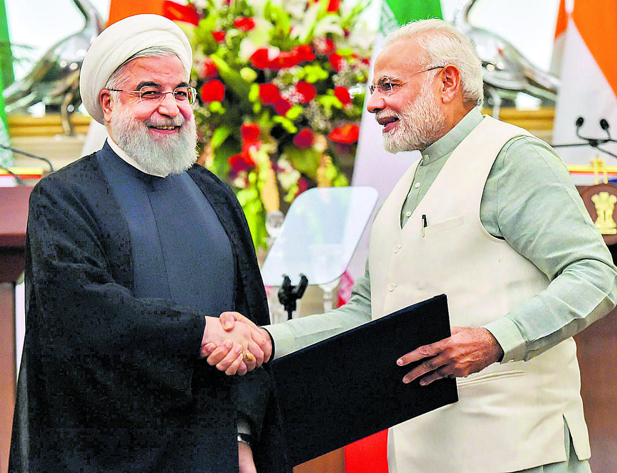 (File) Prime Minister Narendra Modi with Iranian President Hassan Rouhani at the release of a postal stamp commemorating growing economic and trade ties between India and Iran at the Hyderabad House in New Delhi. PTI FILE