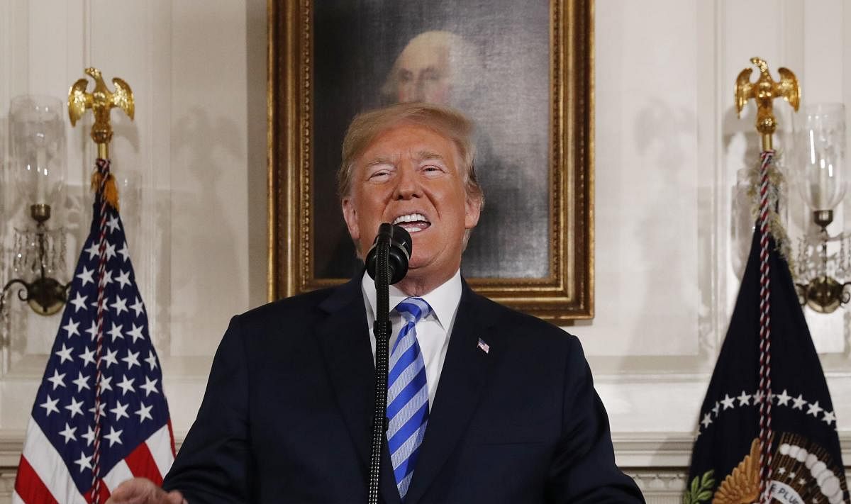 US President Donald Trump on Tuesday pulled out of the landmark nuclear deal with Iran, an Obama-era accord which he has repeatedly criticised. Reuters Photo