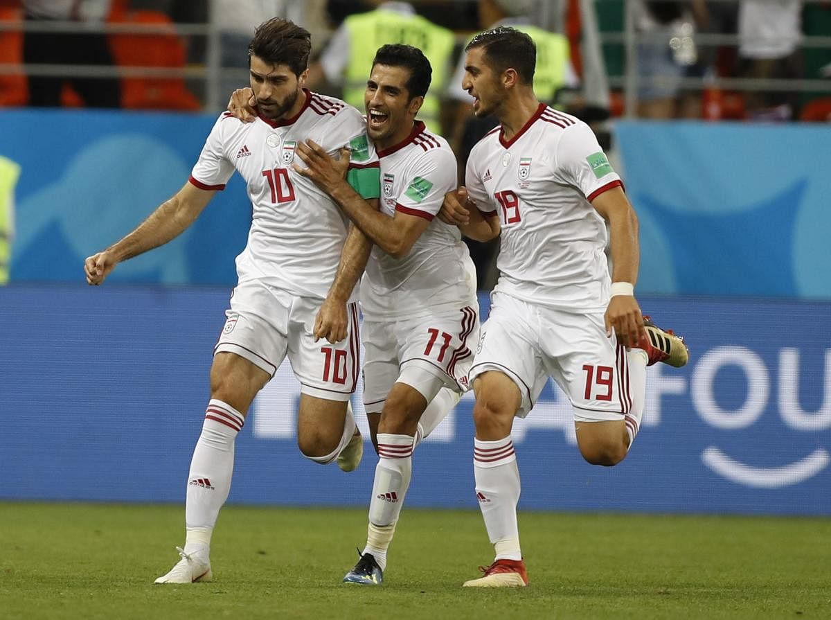 SHOW OF STRENGTH Although Iran crashed out of the group stage, they impressed one and all with their defensive discipline and the ability to push powerhouses Spain and Portugal.