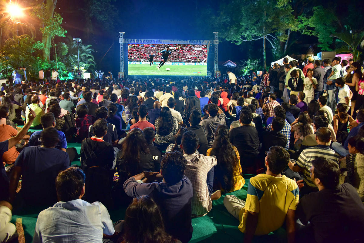 Over 1,500 frenzied football fans squatted before a giant screen installed at the Taj Westend lawns, as France and Croatia battled it out for World Cup honours. 