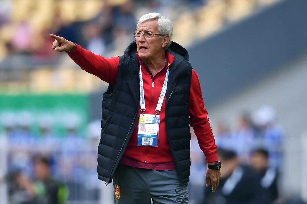 The man under most scrutiny is an Italian, Marcello Lippi, the handsomely paid but increasingly maligned coach of China. (AFP File Photo)