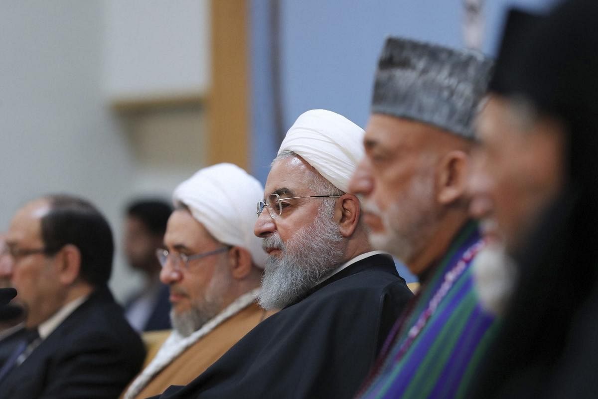 Tehran: In this photo released by official website of the office of the Iranian Presidency, President Hassan Rouhani, center, attends an annual Islamic Unity Conference in Tehran, Iran, Saturday, Nov. 24, 2018. (AP/PTI)