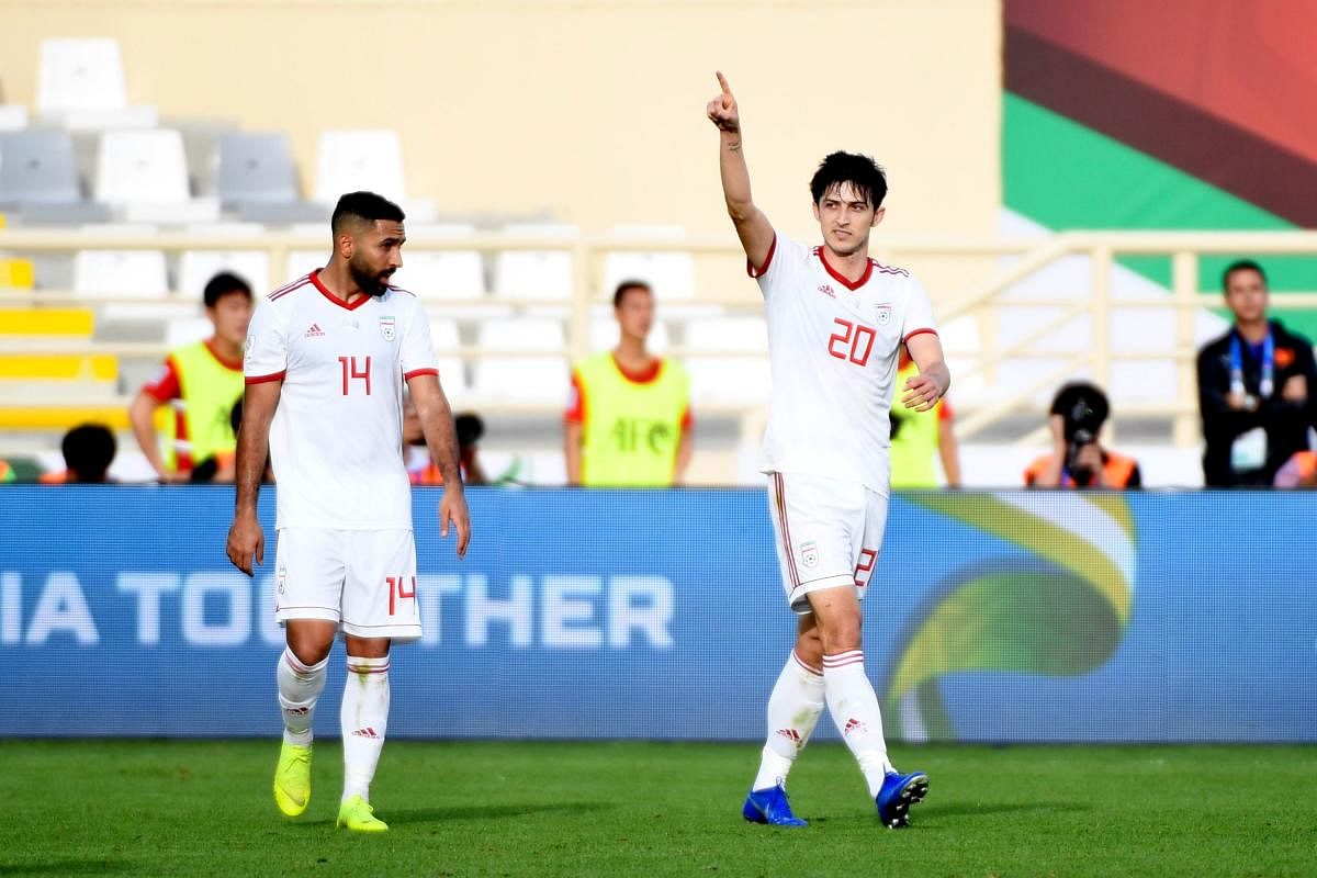 Iran will pin their hopes on Sardar Azmoun (right) to see them through against Iraq during their Group D game on Wednesday. AFP