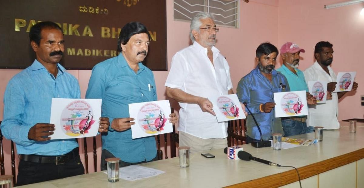 Blue Boys Youth Club office-bearers launch the logo of D Shivappa Memorial Football Tournament at Patrika Bhavan in Madikeri on Monday.