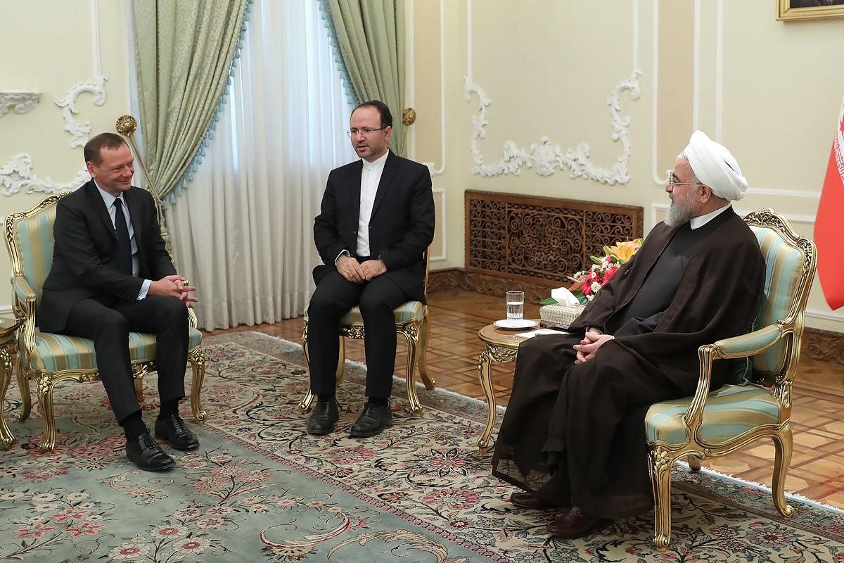 Iran President Hassan Rouhani (R) meeting with Emmanuel Bonne (L), diplomatic advisor to the French president, in the capital Tehran (AFP PHOTO/HO/IRANIAN PRESIDENCY)