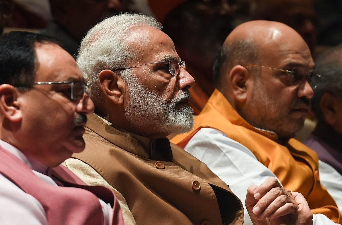 Prime Minister Narendra Modi, BJP working president JP Nadda and Home Minister Amit Shah attend a BJP parliamentary committee meeting at the Parliament house in New Delhi on July 30, 2019. AFP
