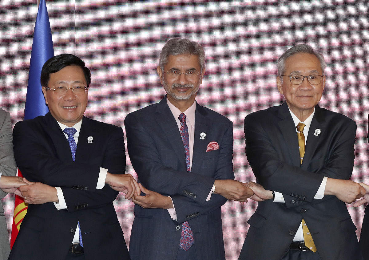 Vietnam's Foreign Minister Pháº¡m Binh Minh, left, India's External Affairs Minister S. Jaishankar, center, and Thailand's Foreign Minister Don Pramudwinai pose together at the start of the India-ASEAN Foreign Ministers' Meeting in Bangkok, Thailand. Photo credit: PTI