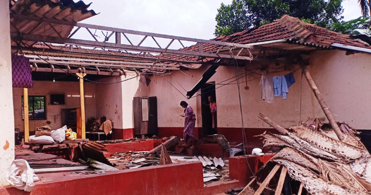 A house damaged due to cloud storm at Pervaje in Karkala taluk on Thursday.