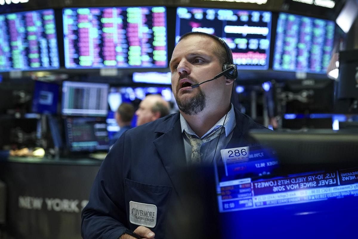 NEW YORK, NY - AUGUST 1: Traders and financial professionals work ahead of the closing bell on the floor of the New York Stock Exchange (NYSE) on August 1, 2019 in New York City. Following large gains earlier in the day, U.S. markets dropped sharply after