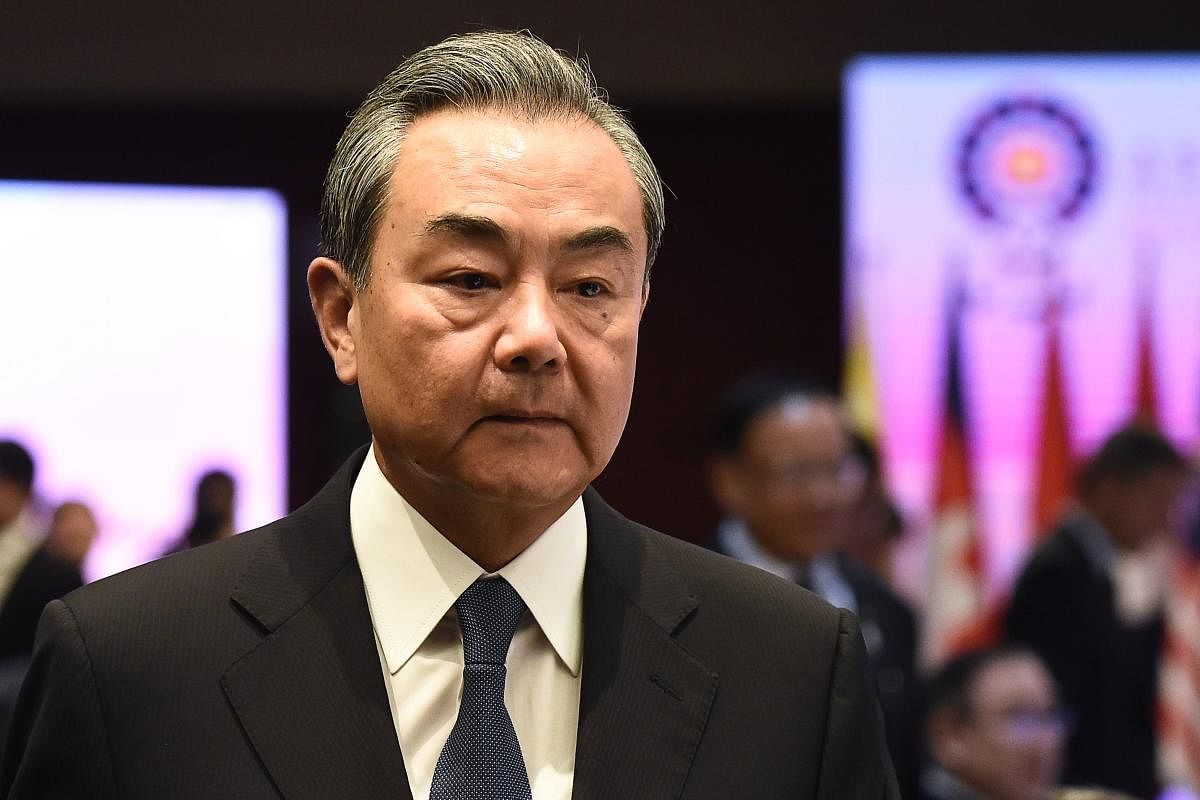 China's Foreign Minister Wang Yi attends the 52nd Association of Southeast Asian Nations (ASEAN) Plus Three Foreign Ministers' Meeting in Bangkok. (AFP Photo)