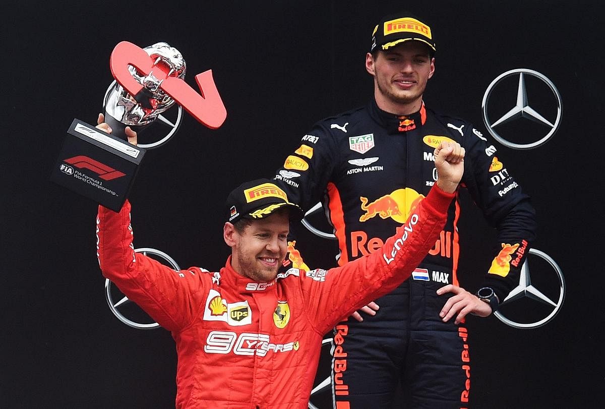 Max Verstappen celebrates on the podium after the German Formula One Grand Prix at the Hockenheim racing circuit. (AFP Photo)