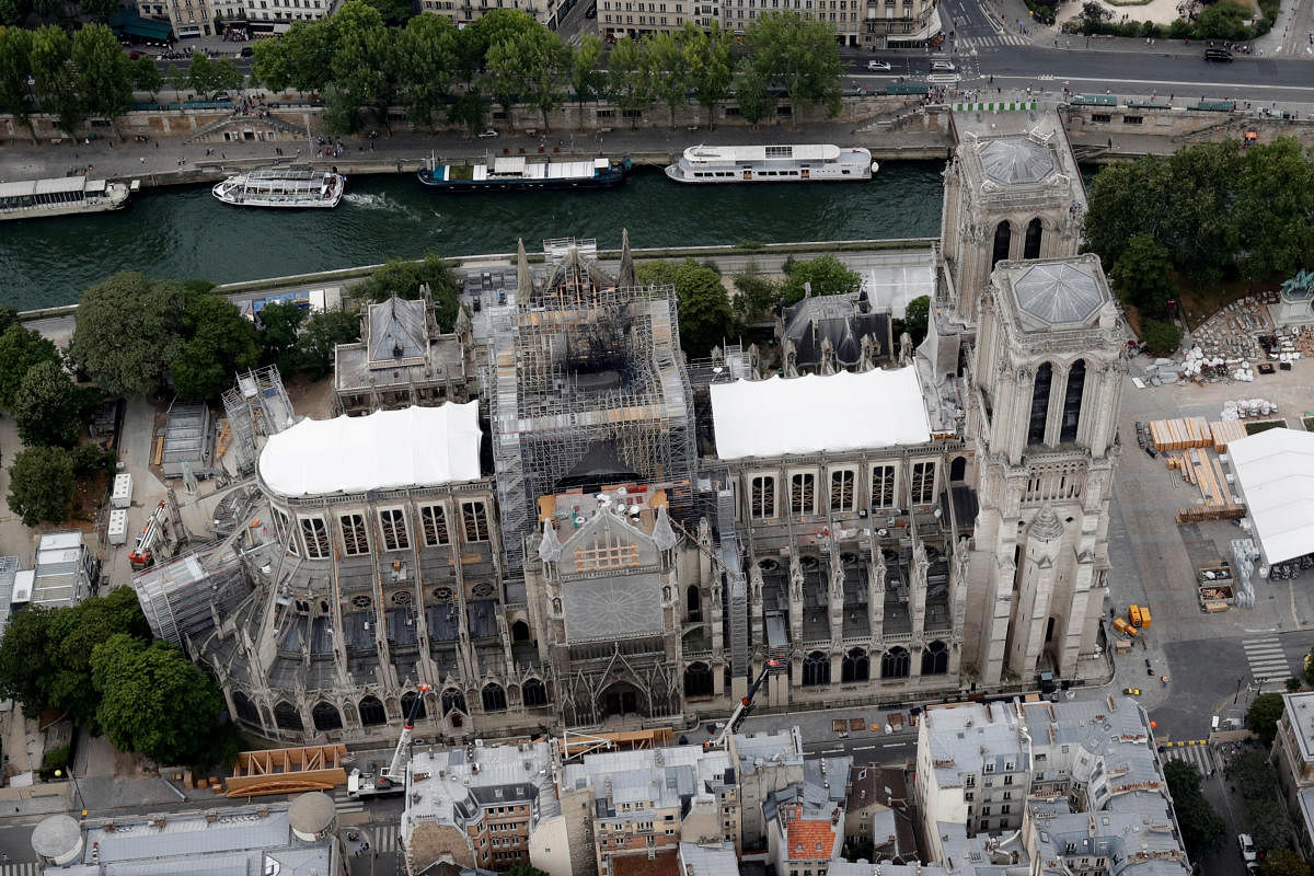 A view shows the damaged roof of Notre-Dame de Paris during restoration work, three months after a fire that devastated the cathedral in Paris, France (Reuters Photo)