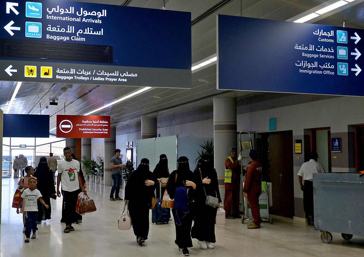 Saudi Arabia will allow women to obtain passports and travel abroad without approval from a male "guardian", the government said on August 2, ending a longstanding restriction that drew heavy international criticism. (AFP Photo)
