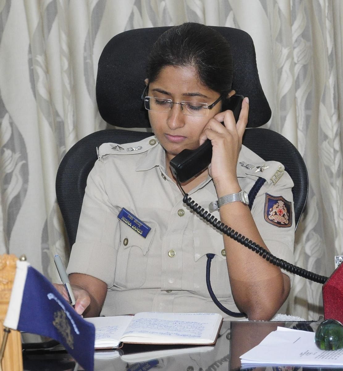 Udupi Superintendent of Police Nisha James replies to a query during the weekly phone-in programme in Udupi on Friday.