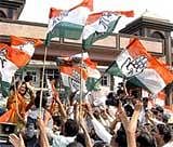 Congress workers celebrate party's win in the Haryana assembly elections in Faridabad on Thursday. PTI