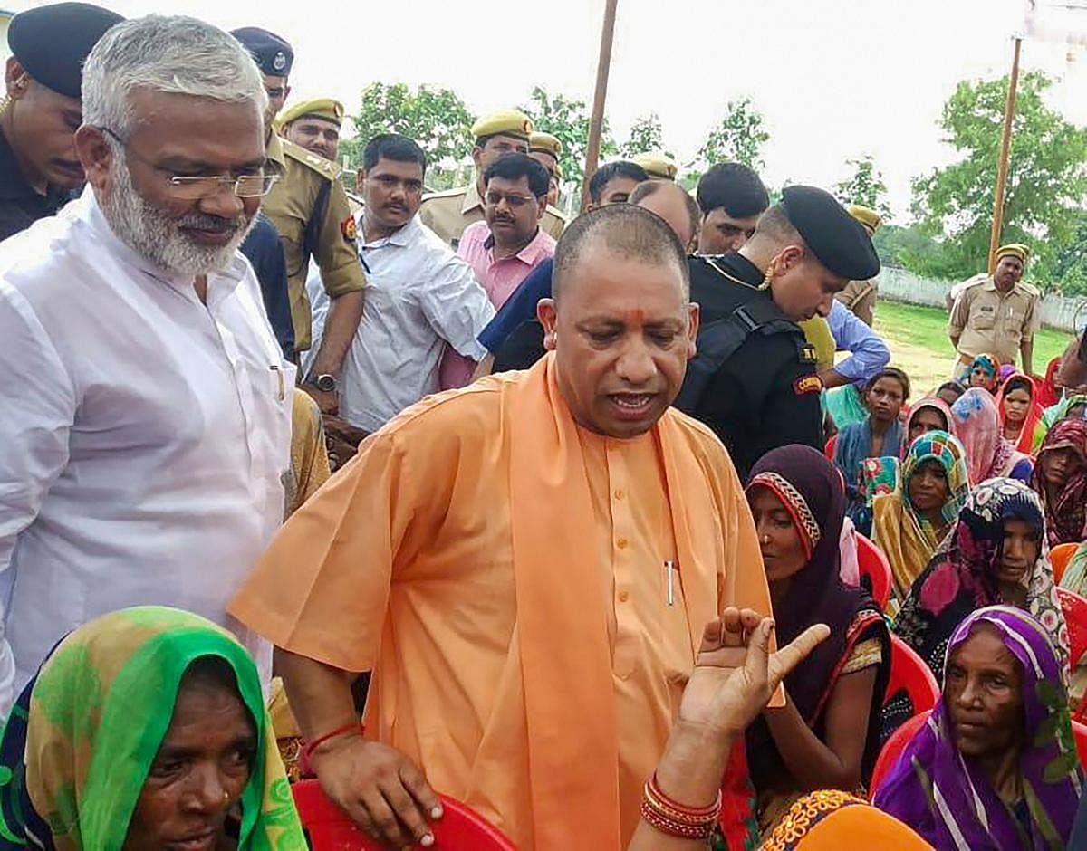 Uttar Pradesh Chief Minister Yogi Adityanath meets the members of the aggrieved families of the in Sonbhadra last month (PTI File Photo)