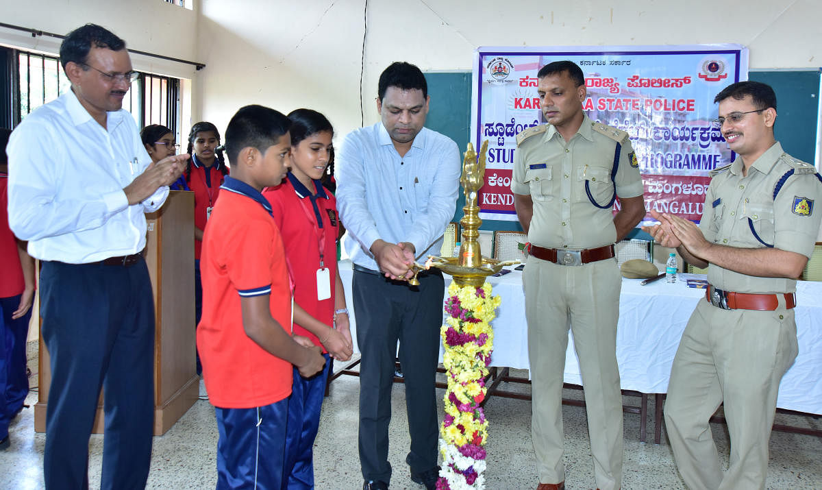 Assistant Commissioner Ravichandra Nayak inaugurates Student Police Cadet at Kendriya Vidyalaya-2 in Ekkur, Mangaluru, on Saturday.
