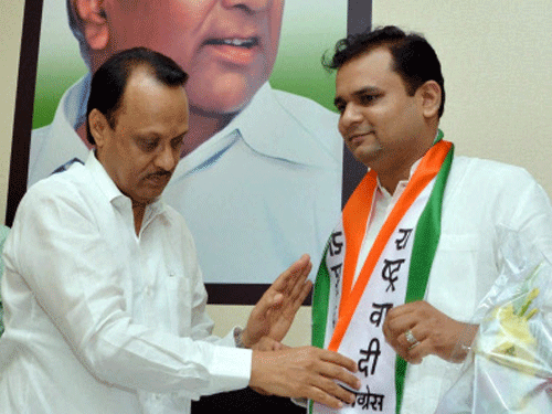 Shiv Sena Youth leader Rahul Narvekar joined NCP flanked by Deputy CM and senior party leader Ajit Pawar in Mumbai on Monday.PTI Photo