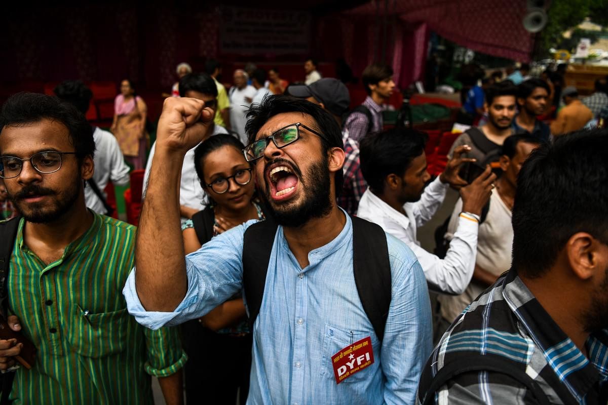 Protestors from various organisations raise slogans as they protest against the detention of human rights activists under the Unlawful Activities Prevention Act (UAPA) in New Delhi on August 30, 2018. AFP File Photo