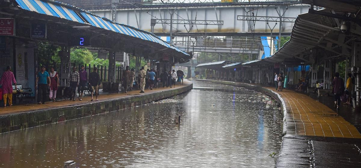 A view of the waterlogged Chunabhatti Station after heavy monsoon rains, in Mumbai, Sunday, Aug. 4, 2019. (PTI Photo) 