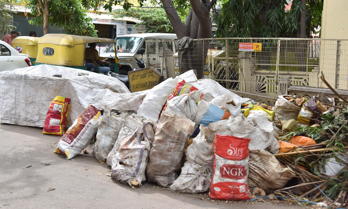 Heap of garbage dumped on Southend road, Malleswara in Bengaluru on Tuesday, 25 June, 2019. Photo by Janardhan B K