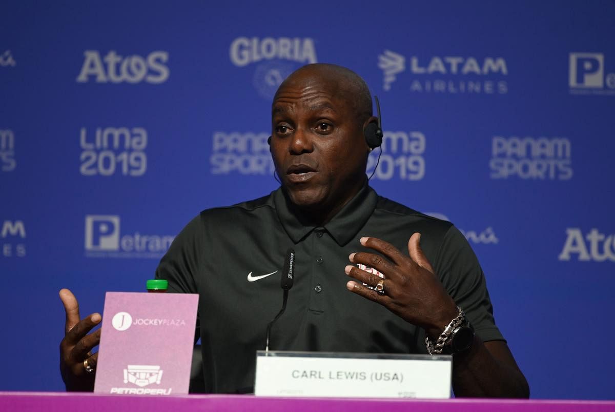 Former Olympic champions Carl Lewis and Leroy Burrell (out of frame) offer a press conference during the Lima 2019 Pan-American Games in Lima on August 5, 2019. (AFP)