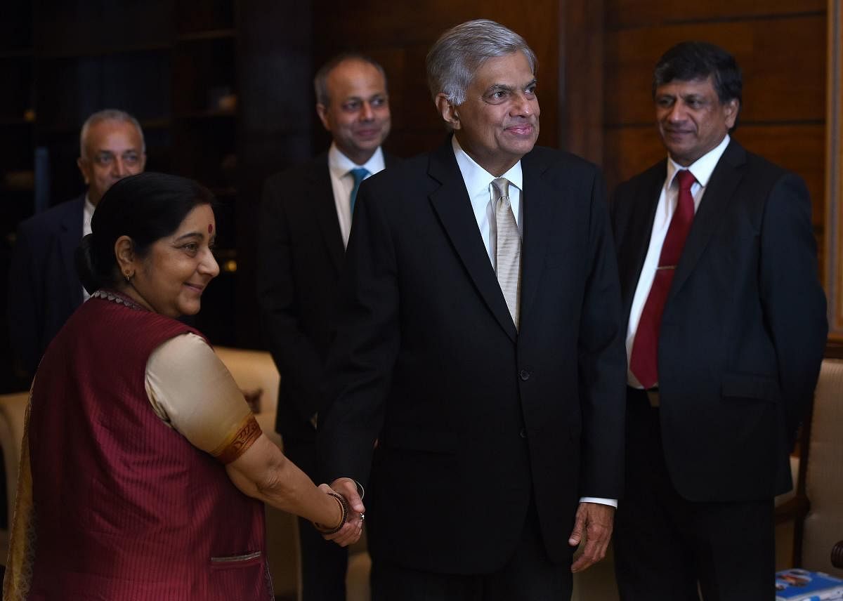 Wickremesinghe said that Swaraj's focus on the bilateral relationship while keeping an interest on achieving regional policy objectives made a lasting impression among the Lankan public. (AFP PHOTO)