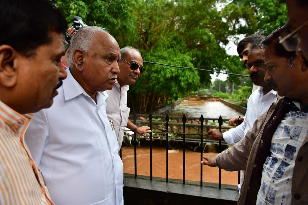 Chief Minister B S Yediyurappa inspecting the flooded SPM Road and Shivaji Garden area area in Belagavi on Thursday.