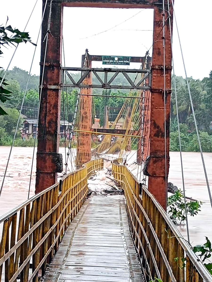 Flood water has damaged hanging bridge at Bedrodi near Uppinangady.
