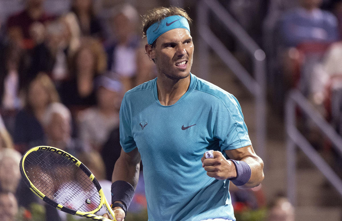Rafael Nadal, of Spain, celebrates his victory over Fabio Fognini, of Italy, during the Rogers Cup men's tennis tournament in Montreal. (AP/PTI Photo)