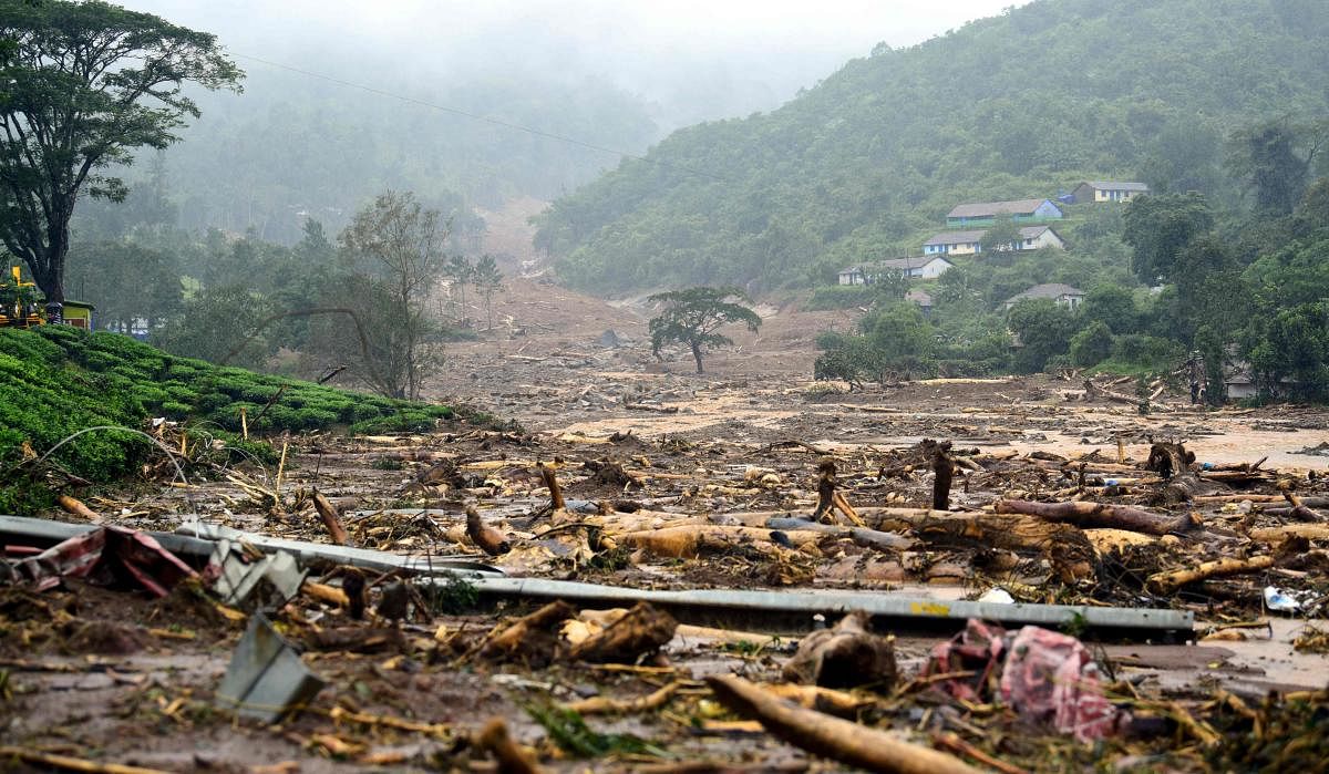 A damaged area is pictured following a landslide in Meppadi, Wayanad district, in the Indian state of Kerala on August 9, 2019. (Photo by STR / AFP)