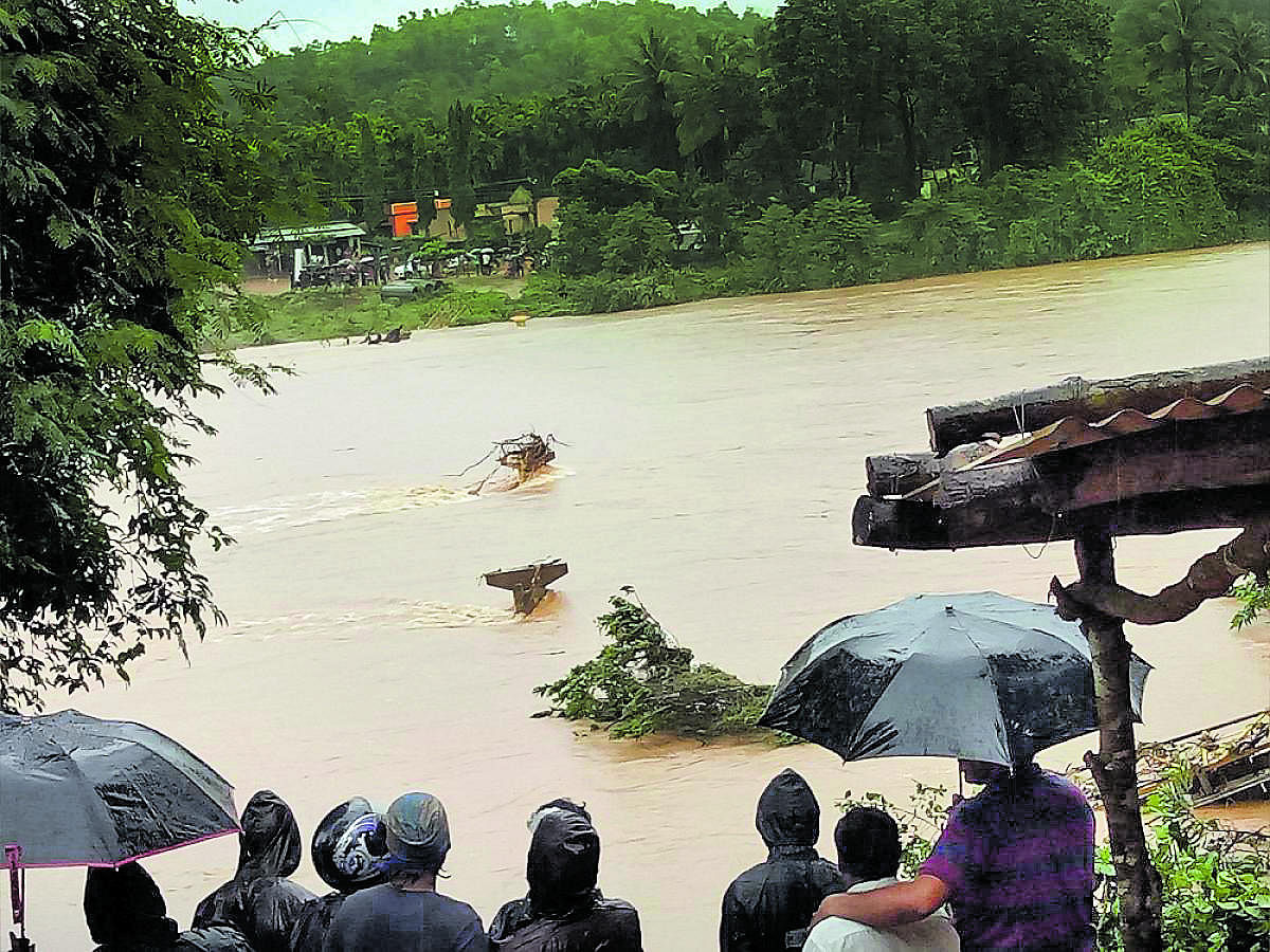 A hanging bridge built across River Nethravathi at Bedrodi near Uppinangady was washed away on Friday night.