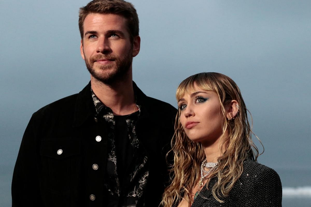 Miley Cyrus and husband Australian actor Liam Hemsworth. (AFP Photo)