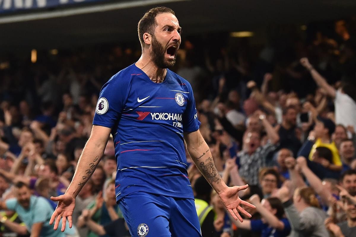 Chelsea's Gonzalo Higuain celebrates after scoring against Burnley in London on Monday. AFP