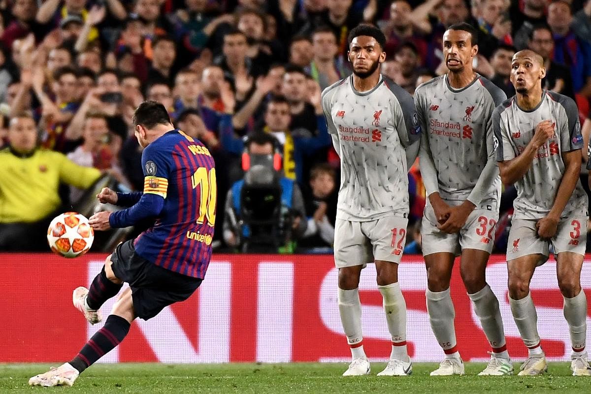 Barcelona's Lionel Messi scores from free-kick during their Champions League semifinal first leg against Liverpool on Wednesday. AFP