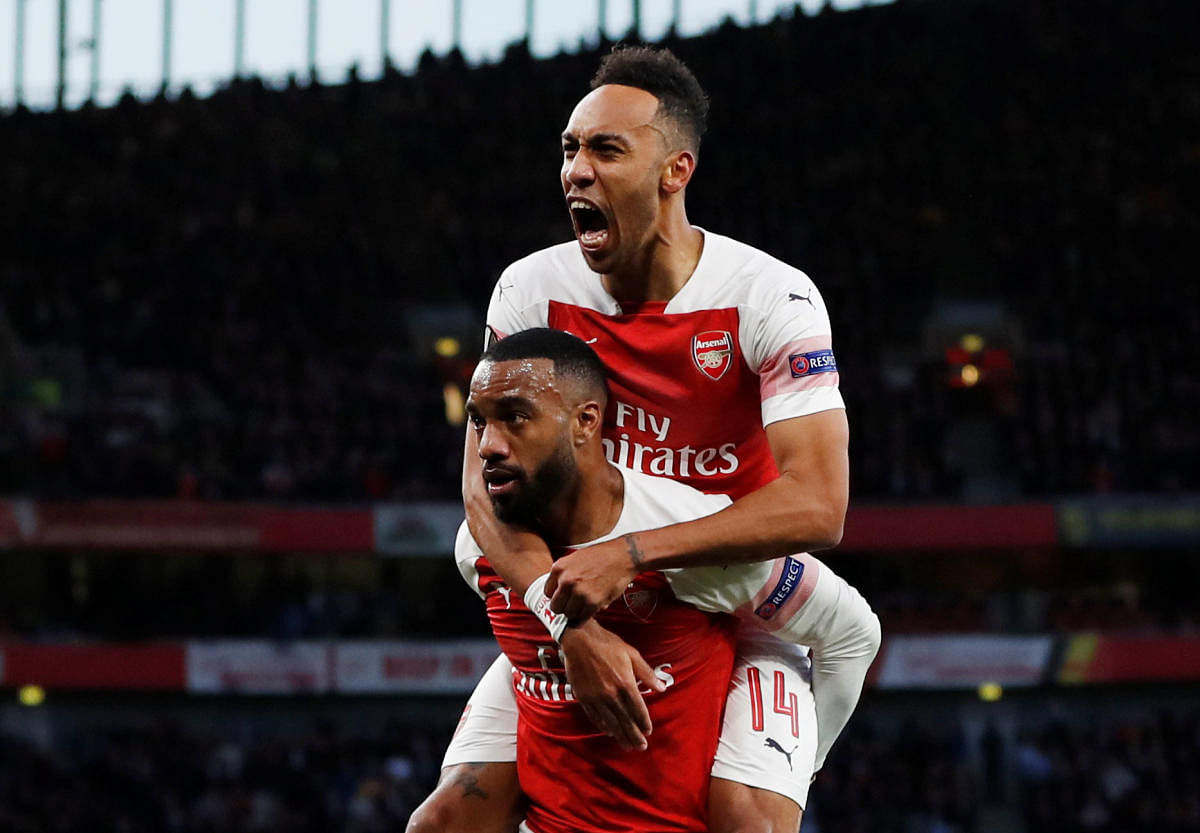 Arsenal strikers Alexandre Lacazette (front) and Pierre-Emerick Aubameyang have forged a wonderful partnership and the duo would be looking to inspire the Gunners against Valencia on Thursday. Reuters