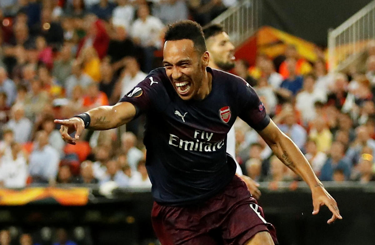 Arsenal's Pierre-Emerick Aubameyang celebrates after scoring against Valencia on Thursday. Reuters