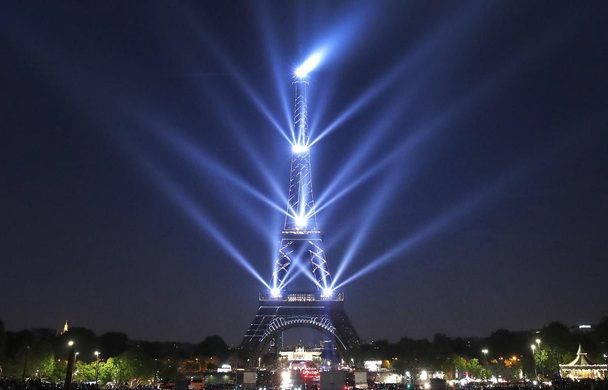 Paris: A light show illuminates the Eiffel Tower for its 130 year anniversary, in Paris, Wednesday, May 15, 2019. Paris is wishing the Eiffel Tower a happy birthday with an elaborate laser show retracing the monument's 130-year history. (Photo PTI)