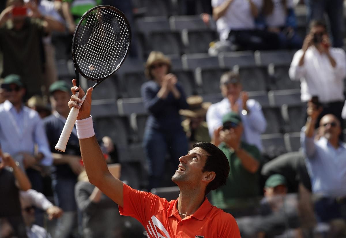 Rome: Serbia's Novak Djokovic celebrates after winning against Canada's Denis Shapovalov at the Italian Open tennis tournament, in Rome. (Photo by PTI)
