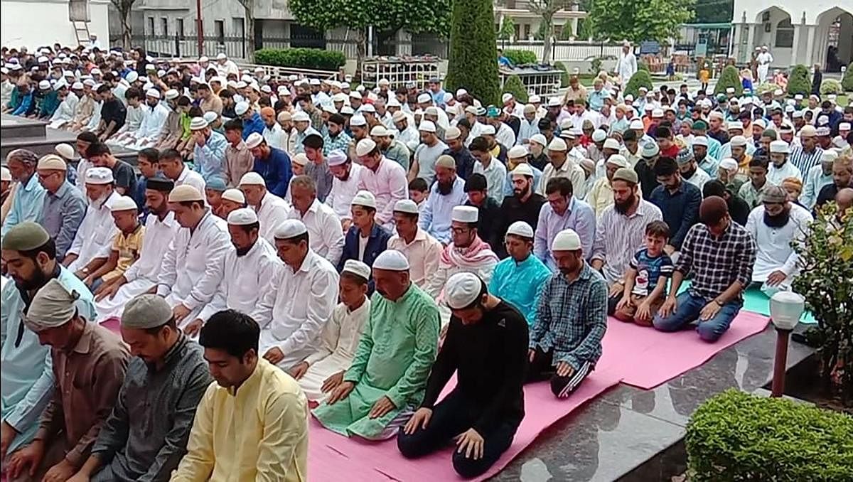 Muslims offer prayers on the occasion of Eid al-Adha, in Srinagar. (PTI Photo)