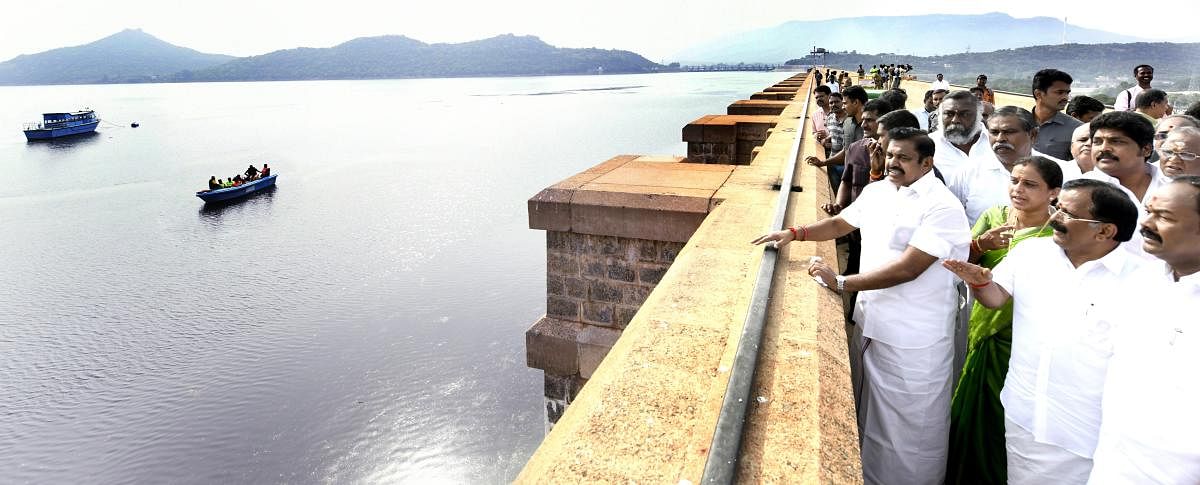 Tamil Nadu Chief Minister Edappadi K Palaniswami at the Stanley Reservoir in Mettur on Tuesday to oversee the opening of sluices of the dam for release of water for irrigation. DH photo