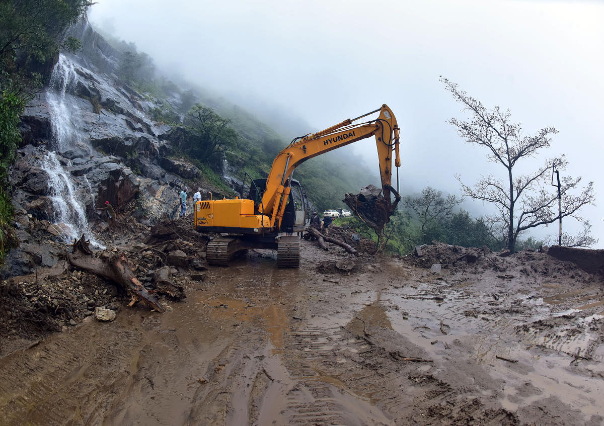 A portion of Charmadi Ghat Road has collapsed after a boulder fell on it.DH Photo/Govindarj Javali
